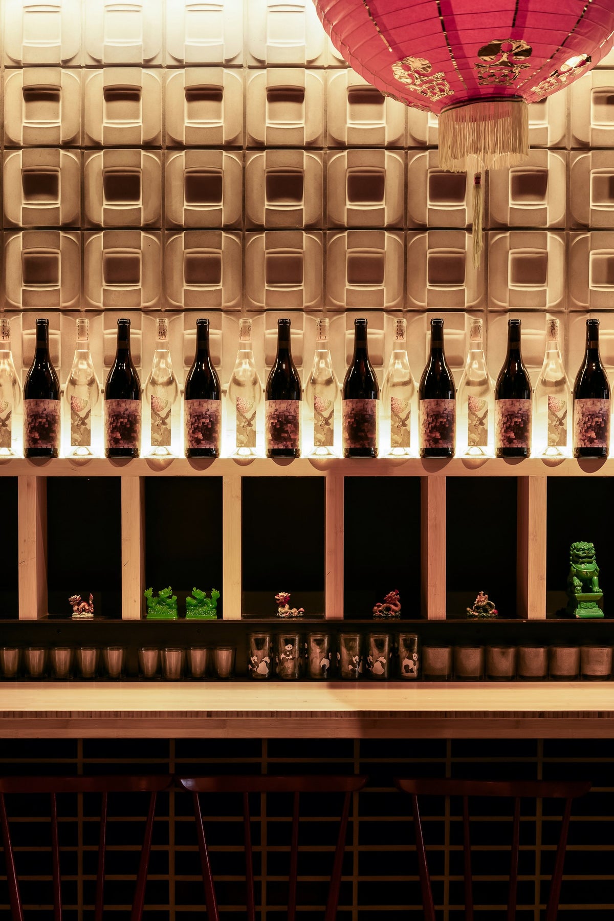 3D Buckle tile behind the bottle display