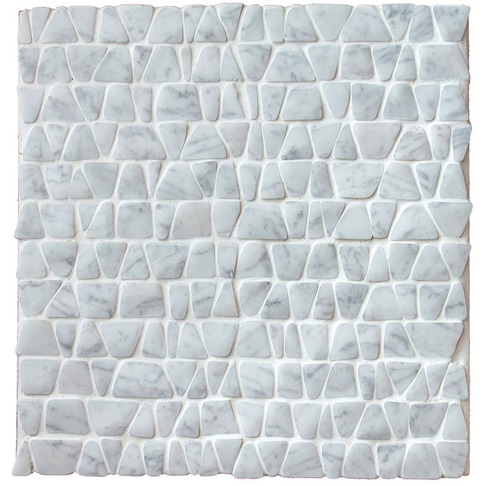 A sheet of Carrara marble mosaic in irregular hand cut pieces of uneven shape and size, white and light grey