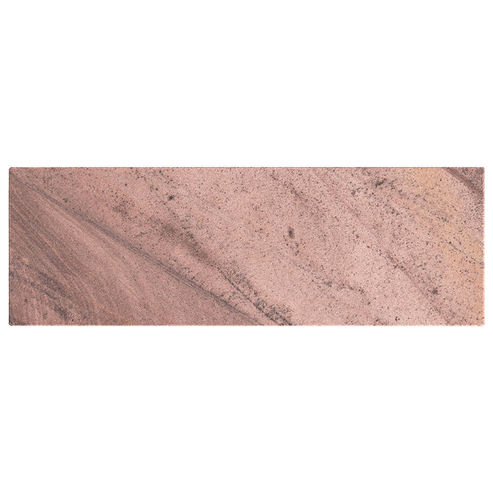 A 4x12 Stone Born piece in Vesper seen flat on against white, dark veins running the length of the honed face