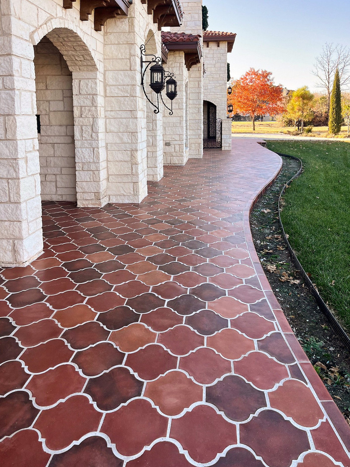 Curving San Felipe tile edge by lawn