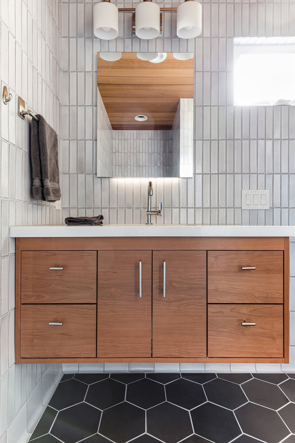 Floating vanity on May Gray hexagon