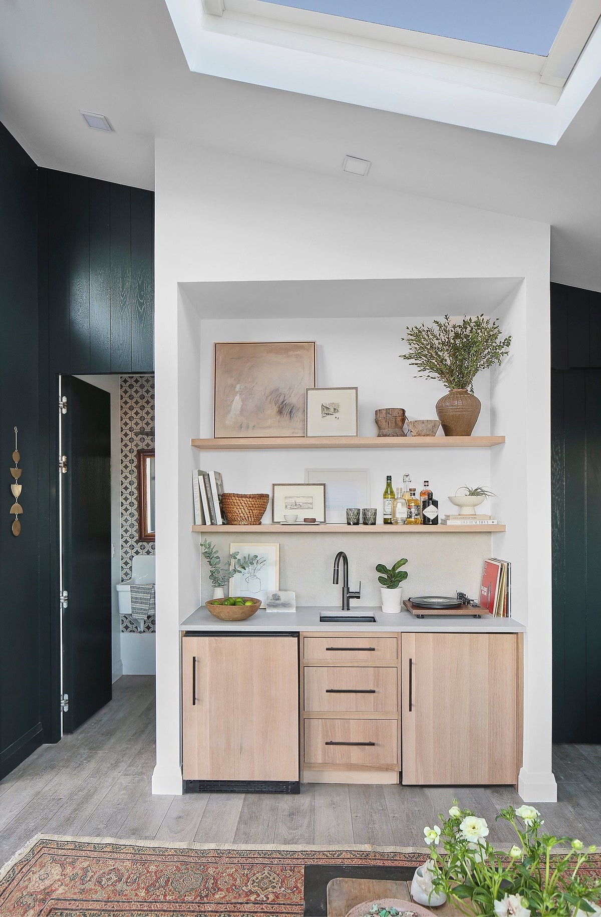 Kitchenette beside the tiled washroom