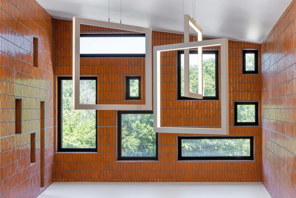 Sunset brick wall with framed windows