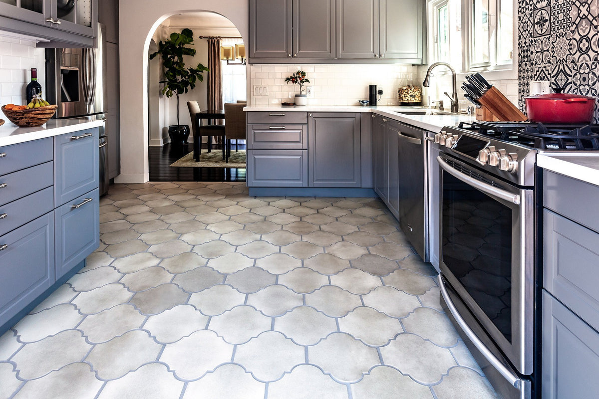 Kitchen floor toward the arched doorway