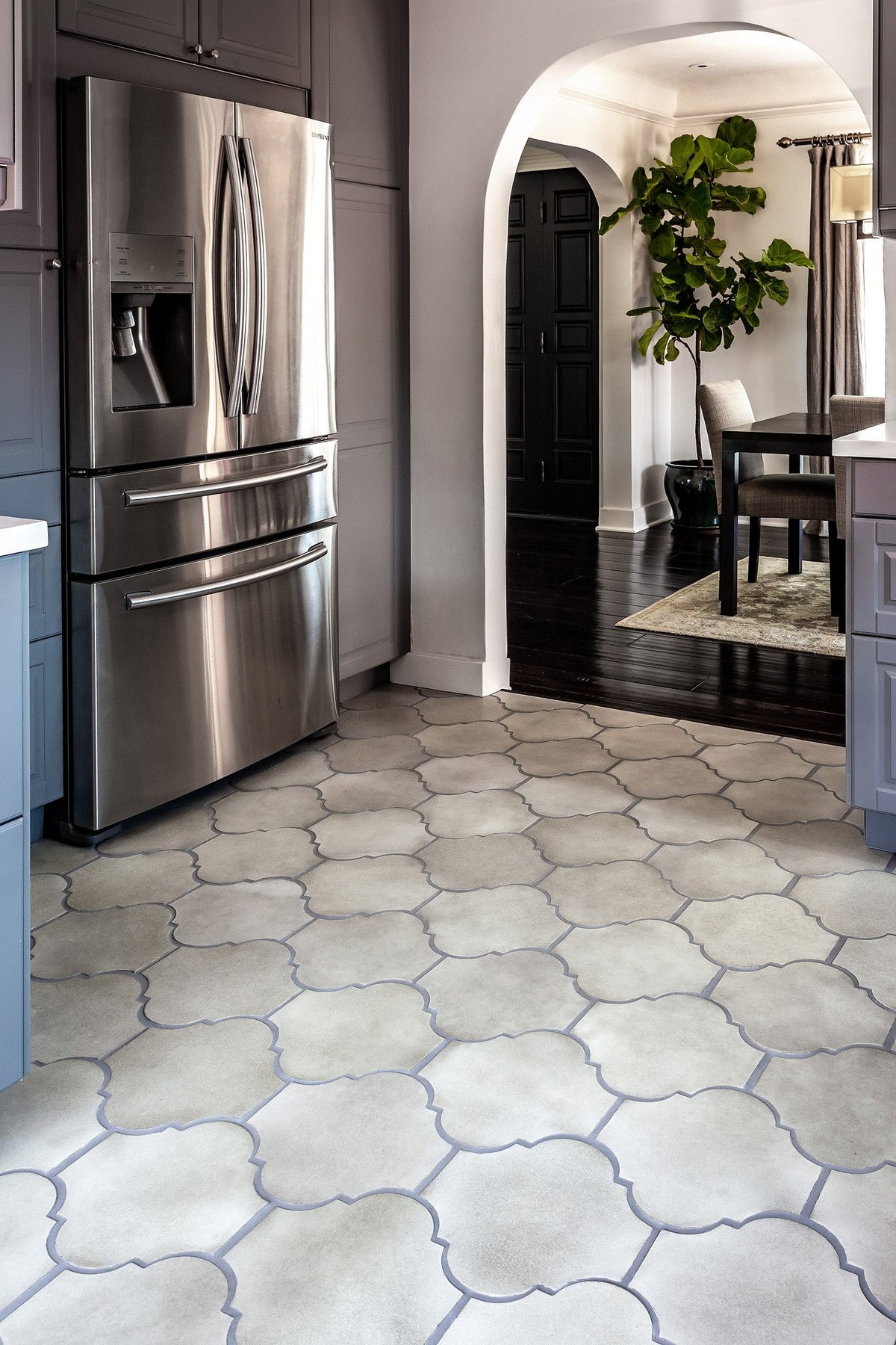 Floor by the fridge and archway
