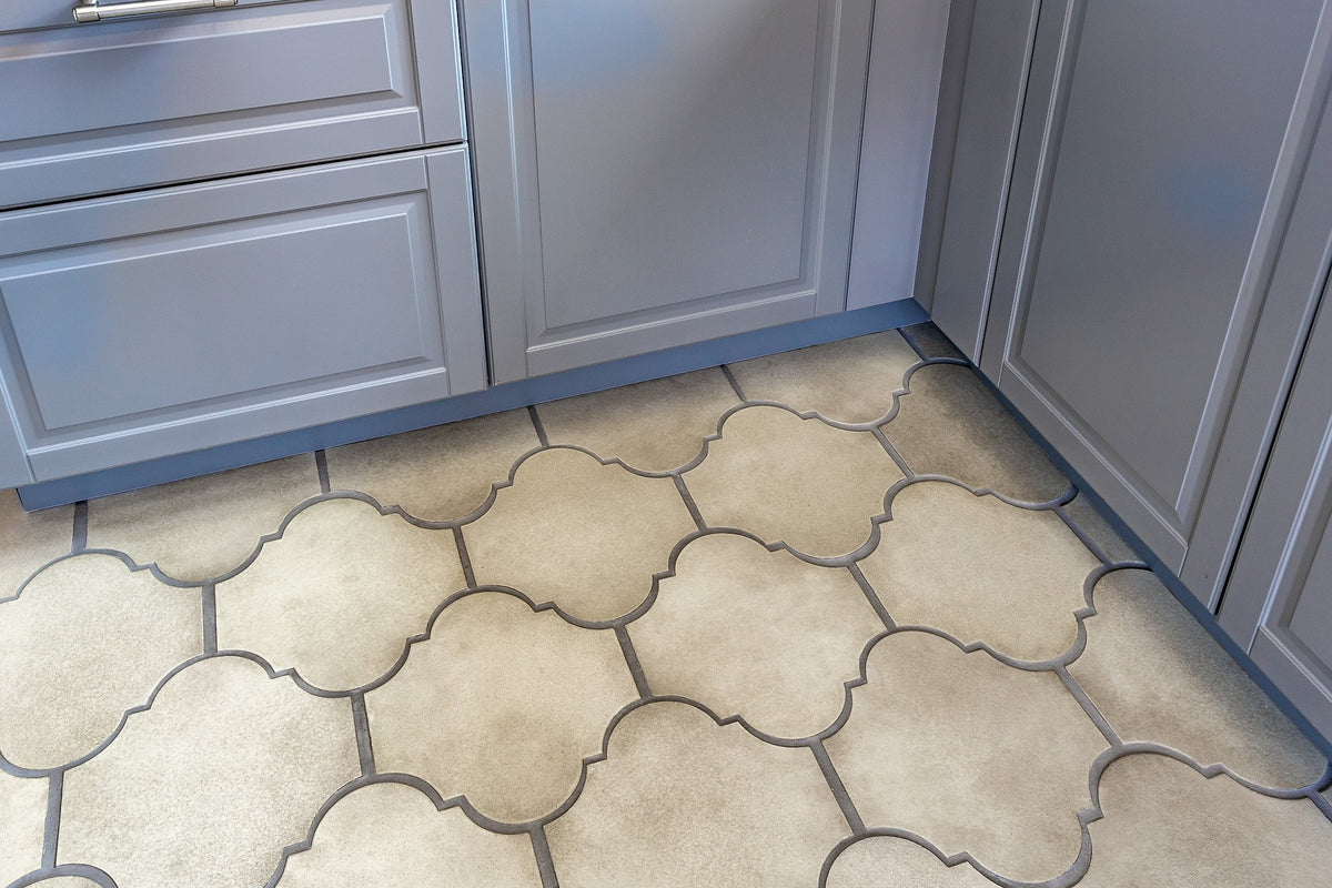 Tile meeting the cabinet toe kick