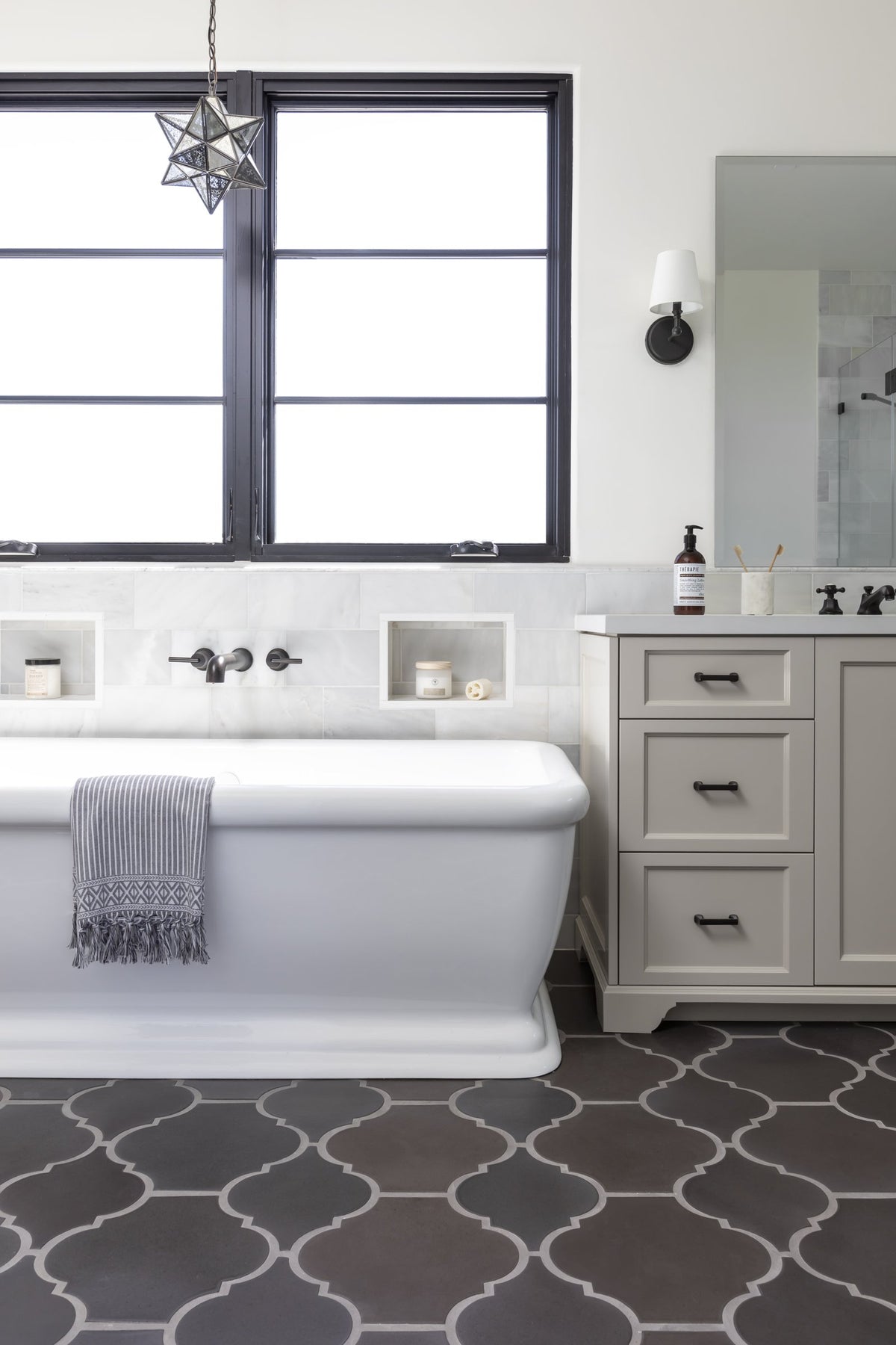 Freestanding tub on the May Gray floor