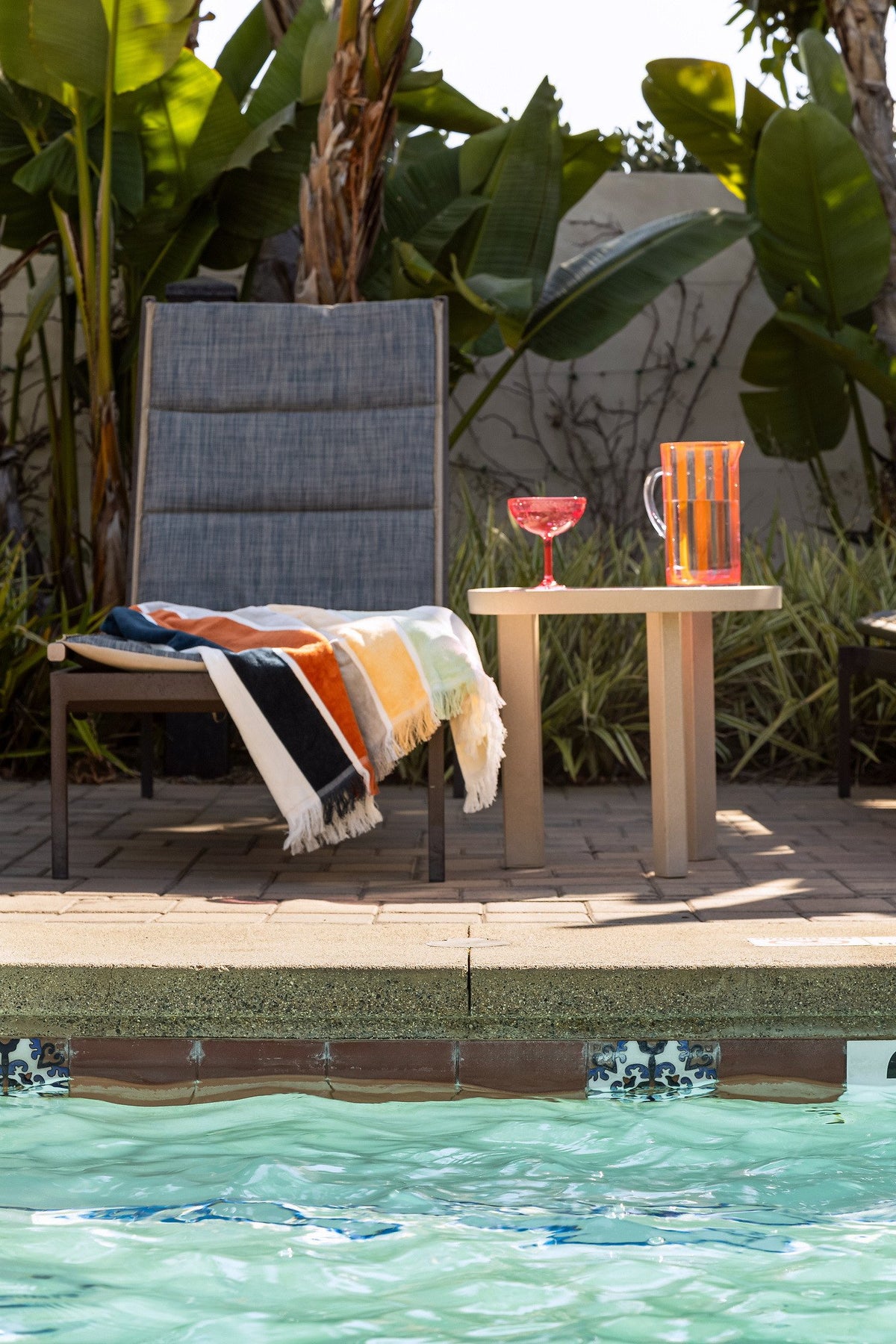 Deco accent tiles at the pool edge