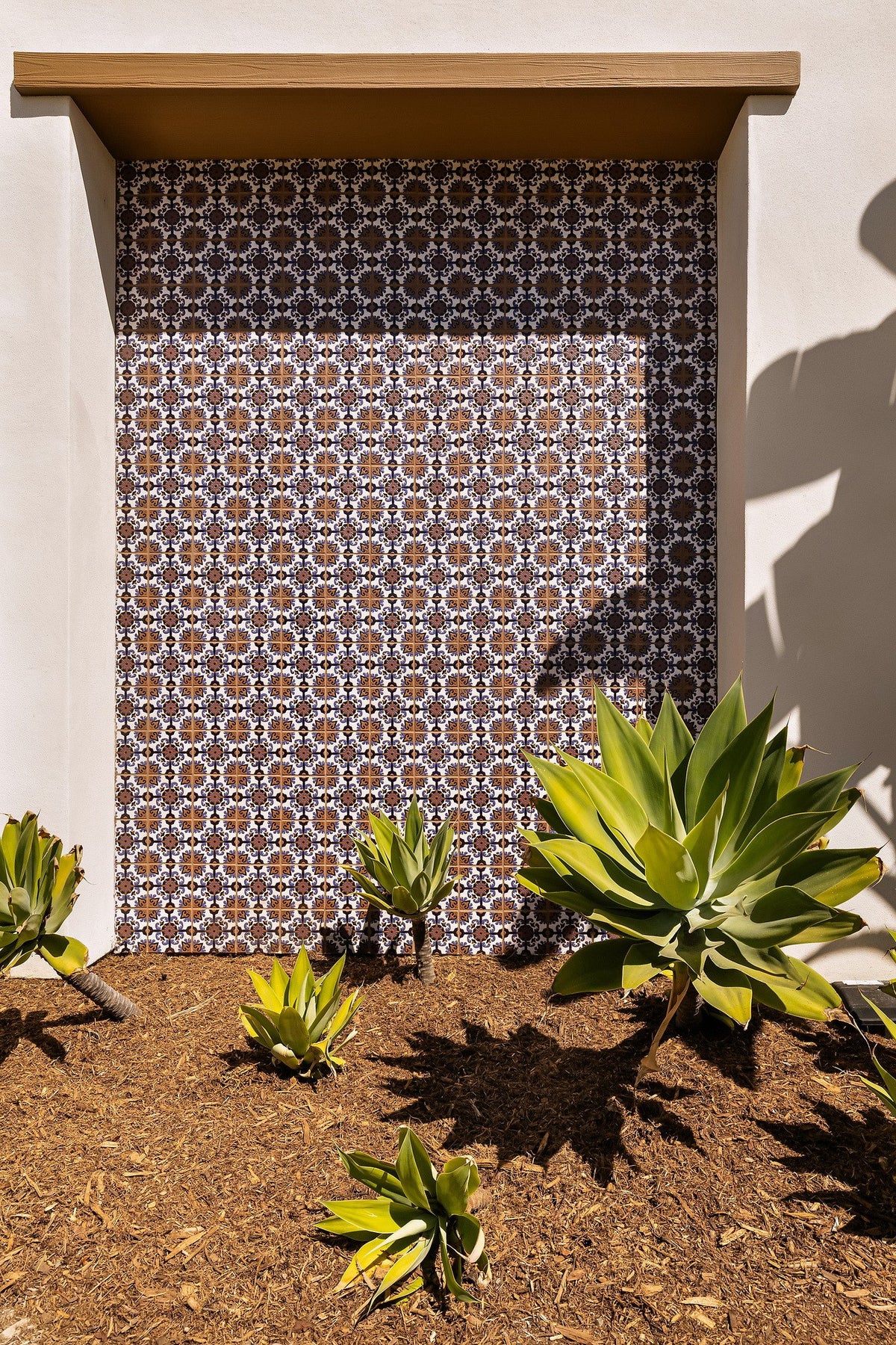 Garden wall panel of blue deco tile
