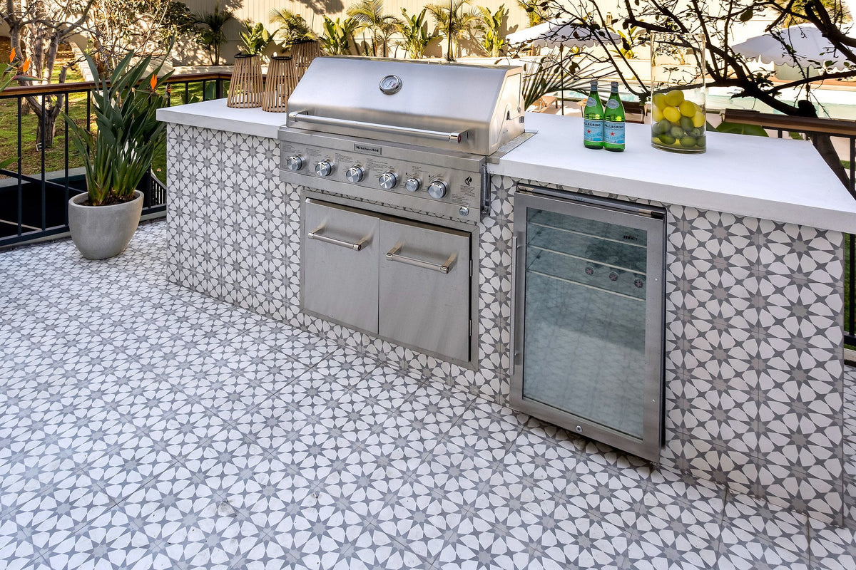 Deck with outdoor kitchen in Kasbah tile