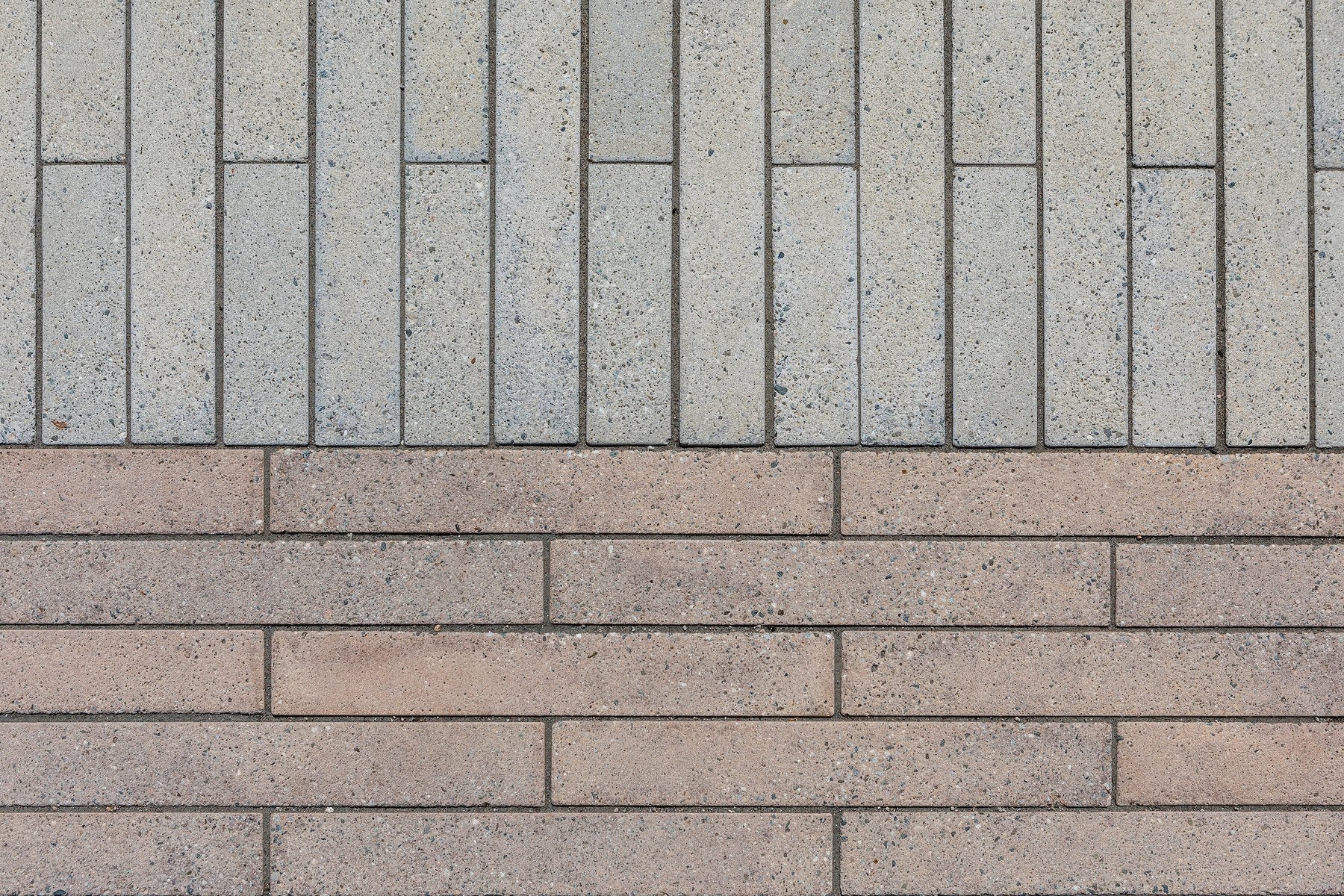 Long narrow concrete pavers seen from above in two colors, LA Port Police Station