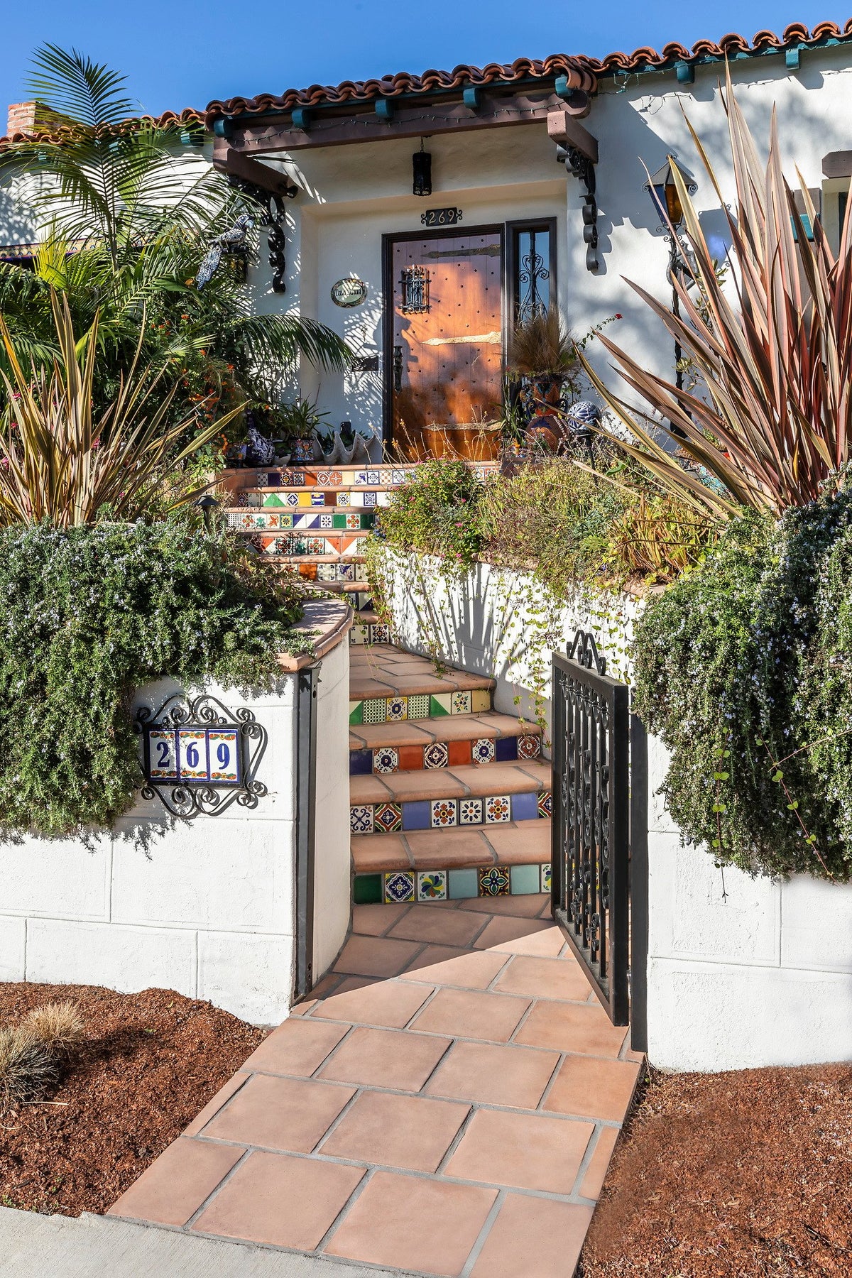 Gated entry walk and tiled steps