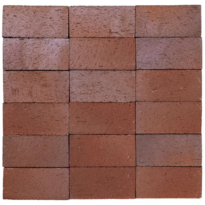 Several Catalina brick pavers in Red Flashed laid up together, showing the range within the color