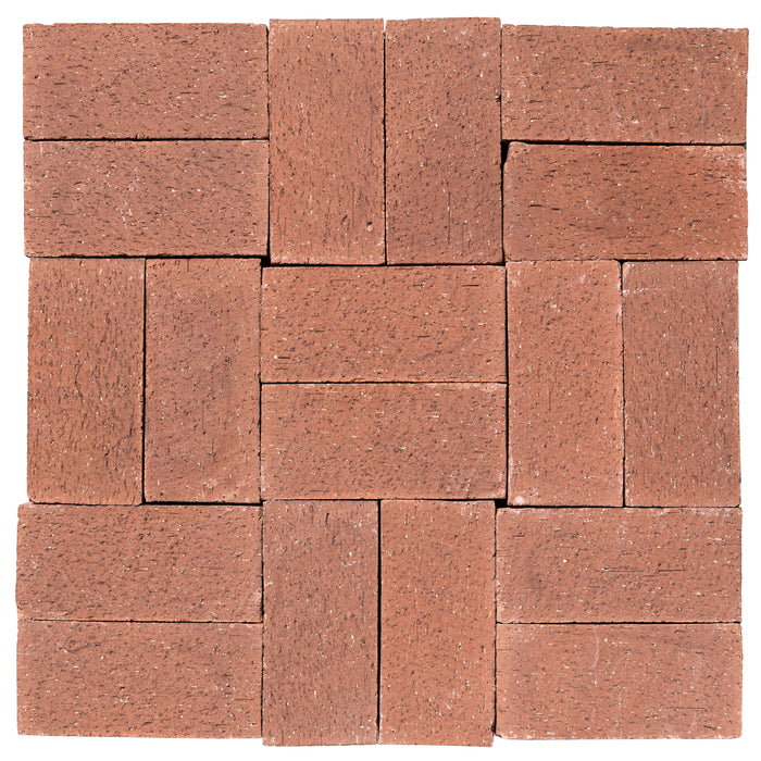 Several Catalina brick pavers in Rose Tan laid up together, showing the range within the color