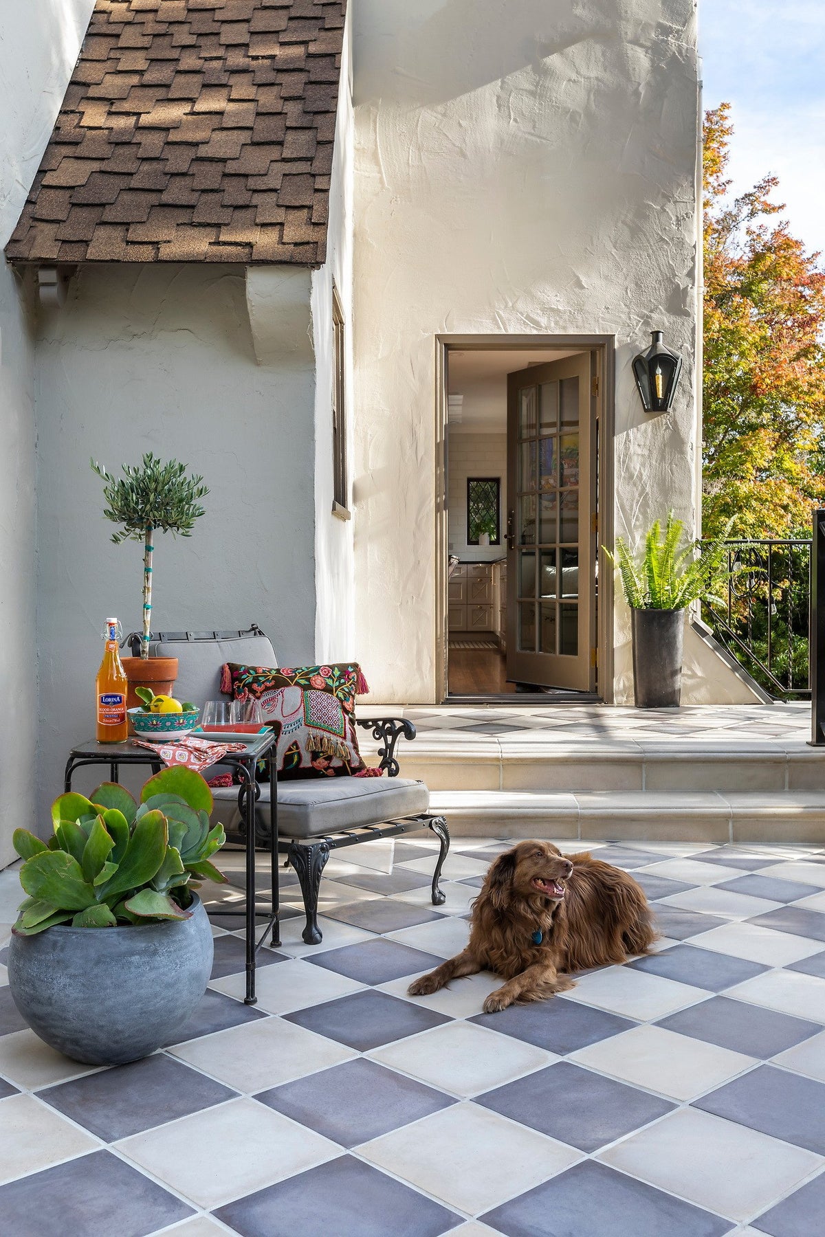 Checkered terrace by the French doors