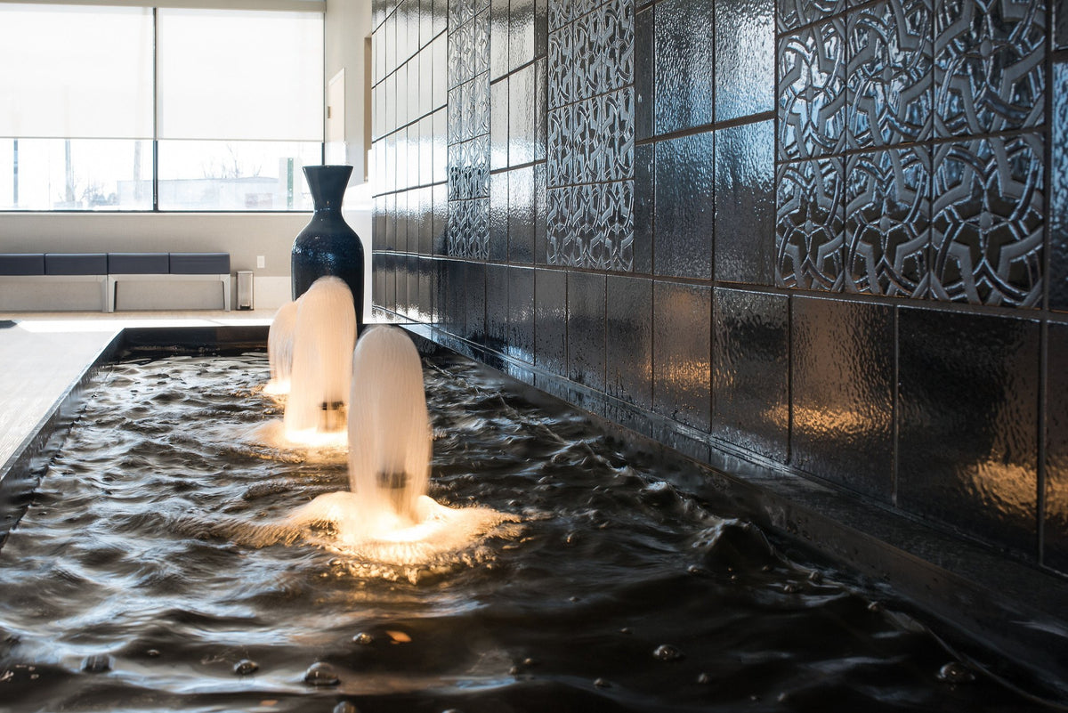 Fountain before the Studio tile wall