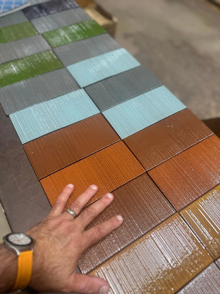 Glazed Corduroy tiles laid out together, greens, greys, blues and reds