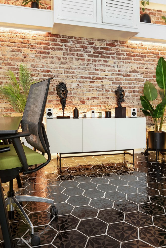 A Silk Road hexagon floor at Design Studio MV, run wall to wall against exposed brick