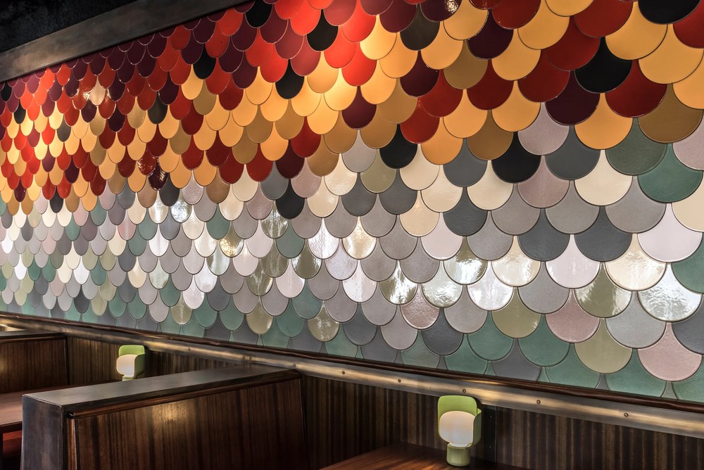 Studio Conche laid as a scaled wall in a restaurant, many glazes together
