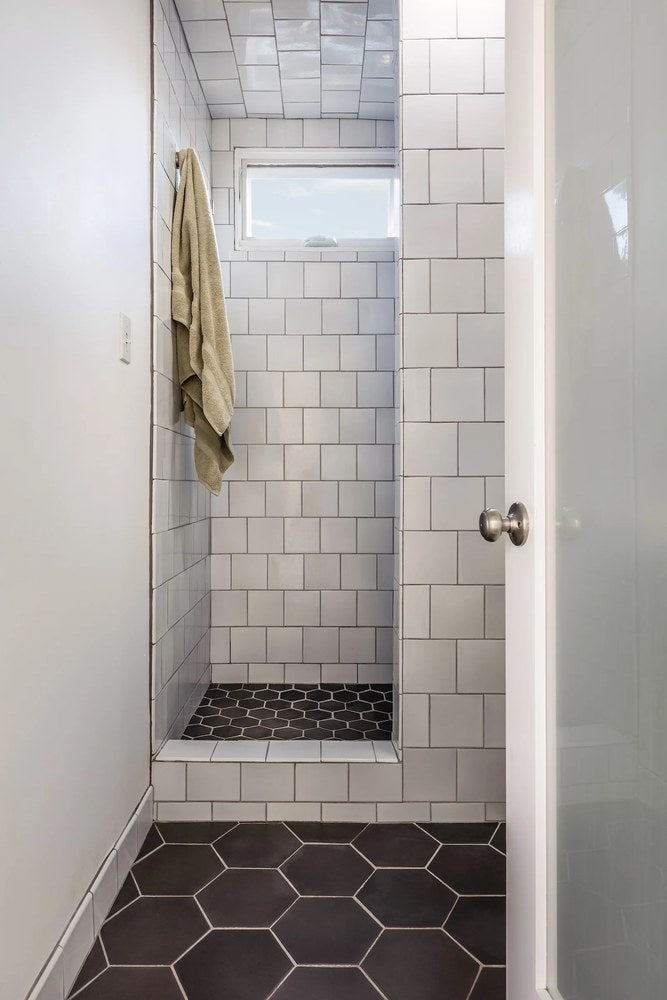 Studio Pure White 6x6 in a shower, over a May Gray hexagon floor