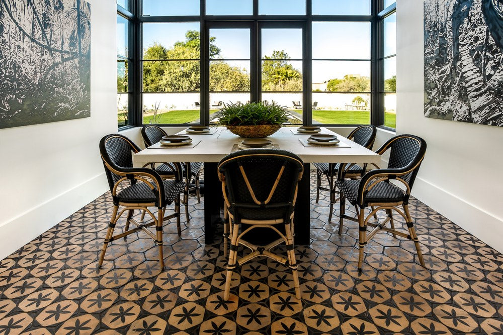 A dining room floor laid in Tierra Madre hexagon decos on the blonde body, at Iconic Haus