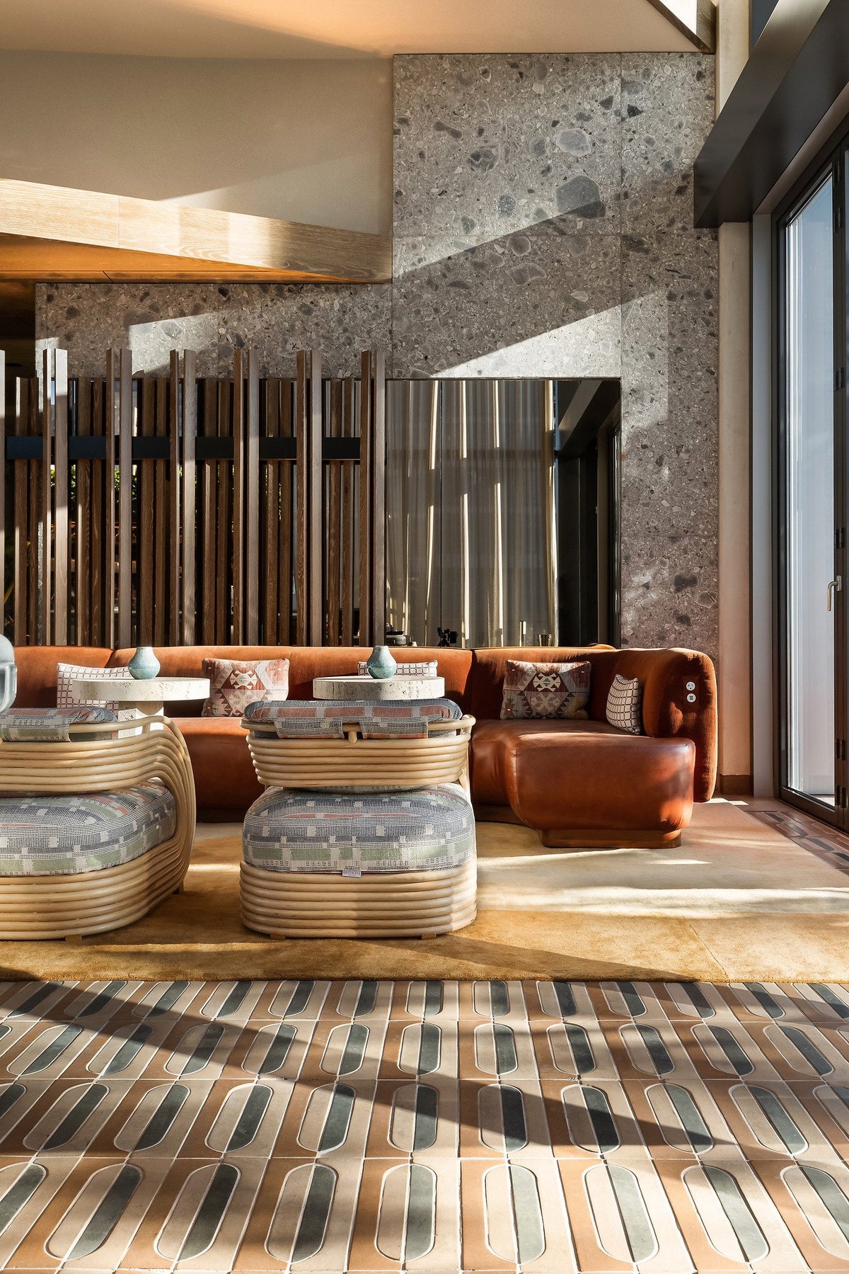 Lounge with rust velvet sofas