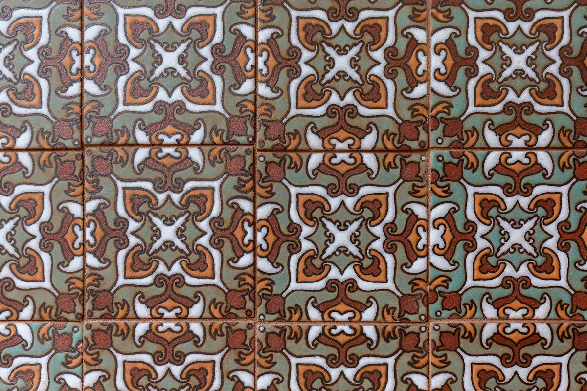 Hand-painted deco tile close-up