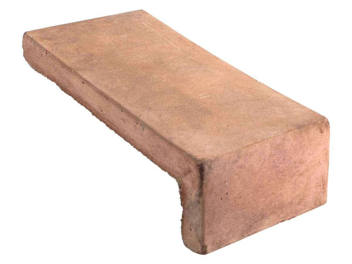Swept short corner piece in Cotto Gold, 4 by 8