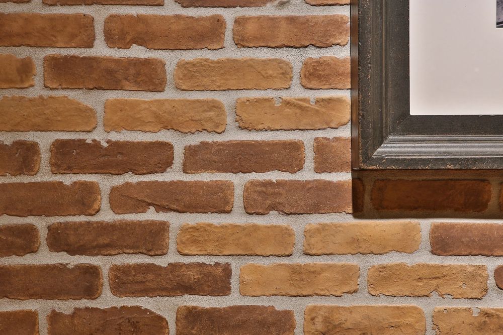 Antik Brick Veneer in Tuscan Mustard, interior wall at Hook Burger