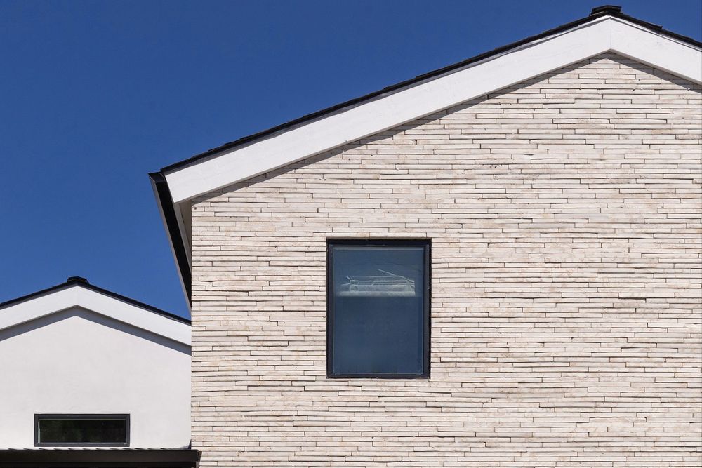 Newport Brick Veneer in Early Gray Limestone on a Manhattan Beach modern facade