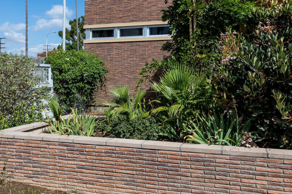 Villagio Brick in Josie Blend on a multipurpose center facade and planter wall