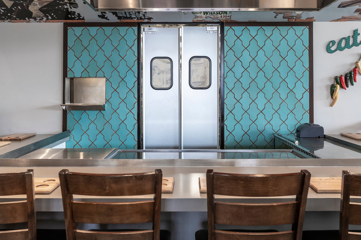 Turquoise Arabesque behind the grill