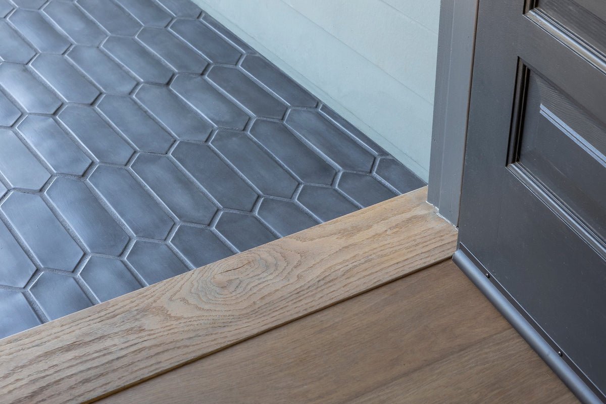 Charcoal Picket at the doorway