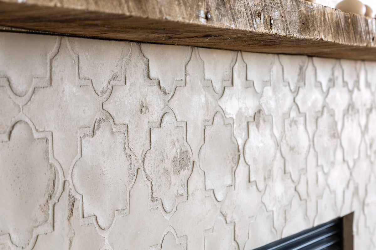 Arabesque pattern under the mantel