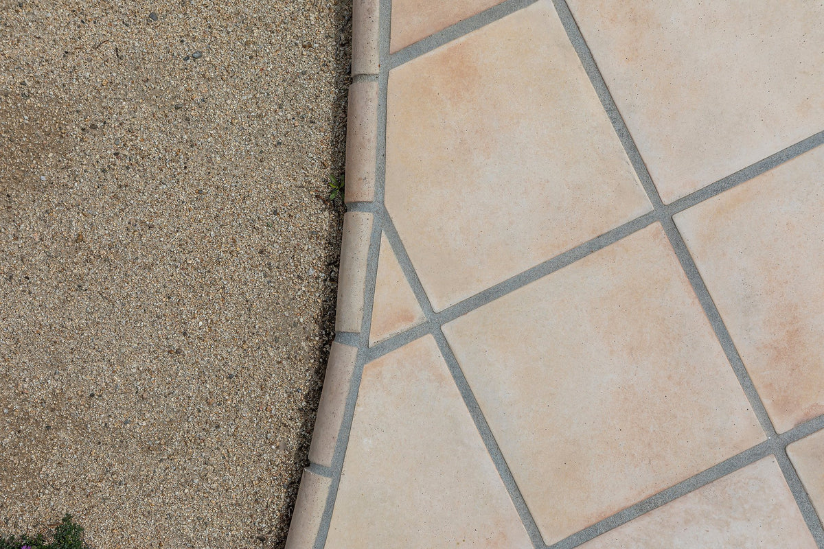 Curved edge of the tile walkway