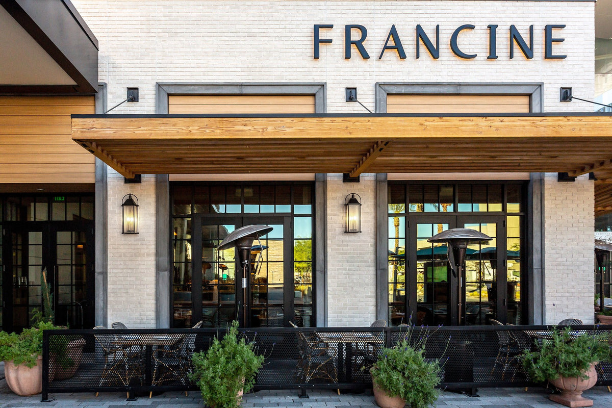 Storefront and sign above the patio