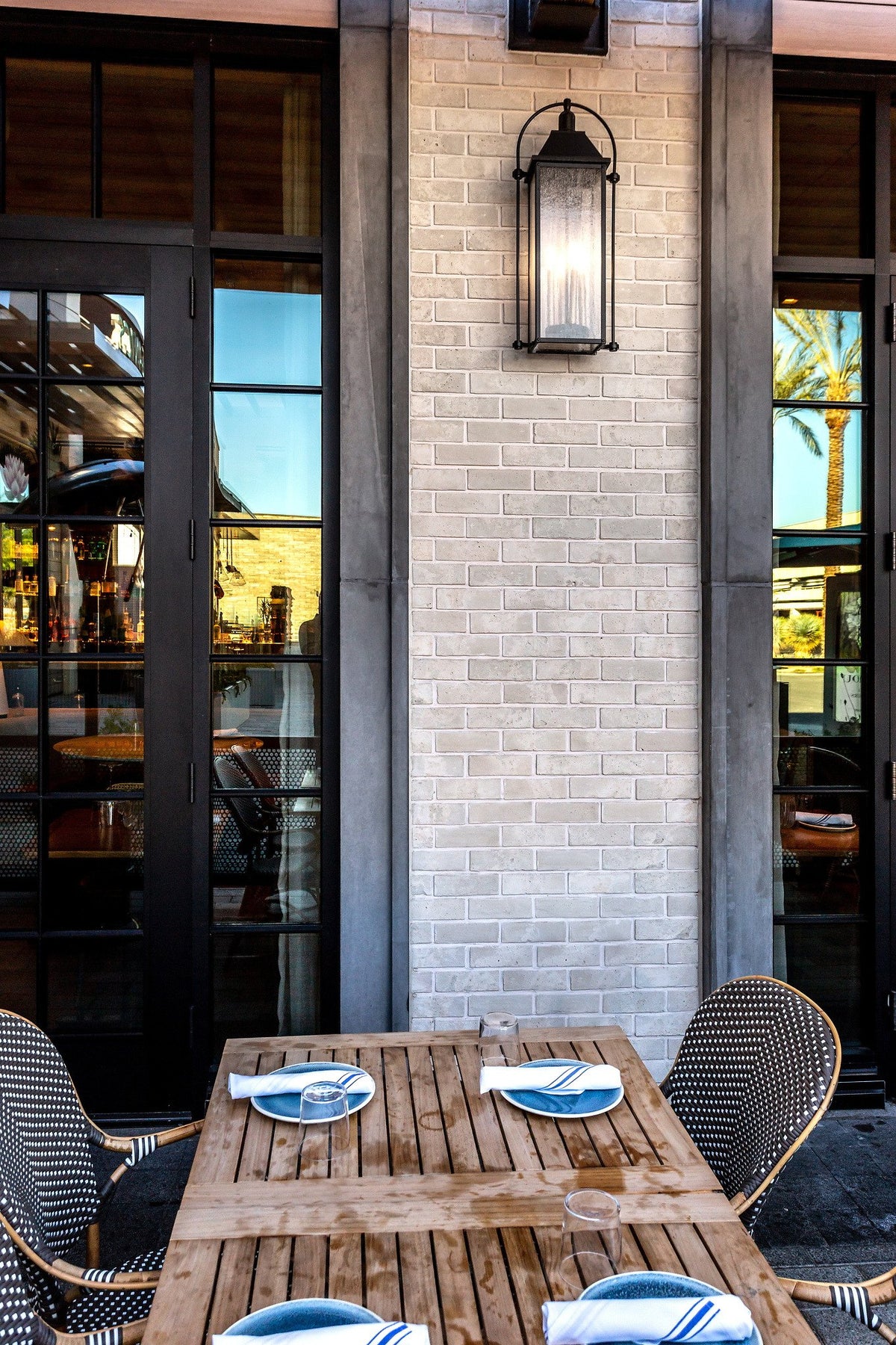 Brick pier between tall windows