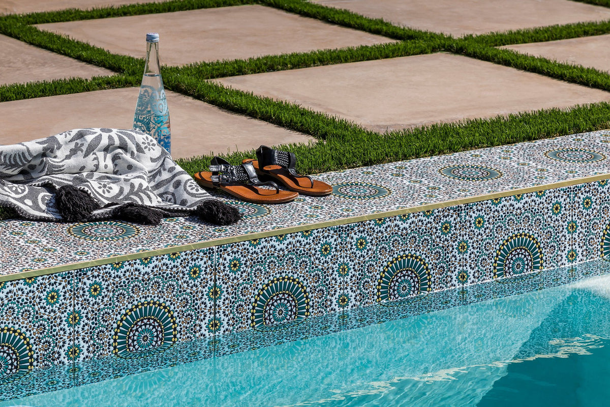 Pool coping and handpainted tile