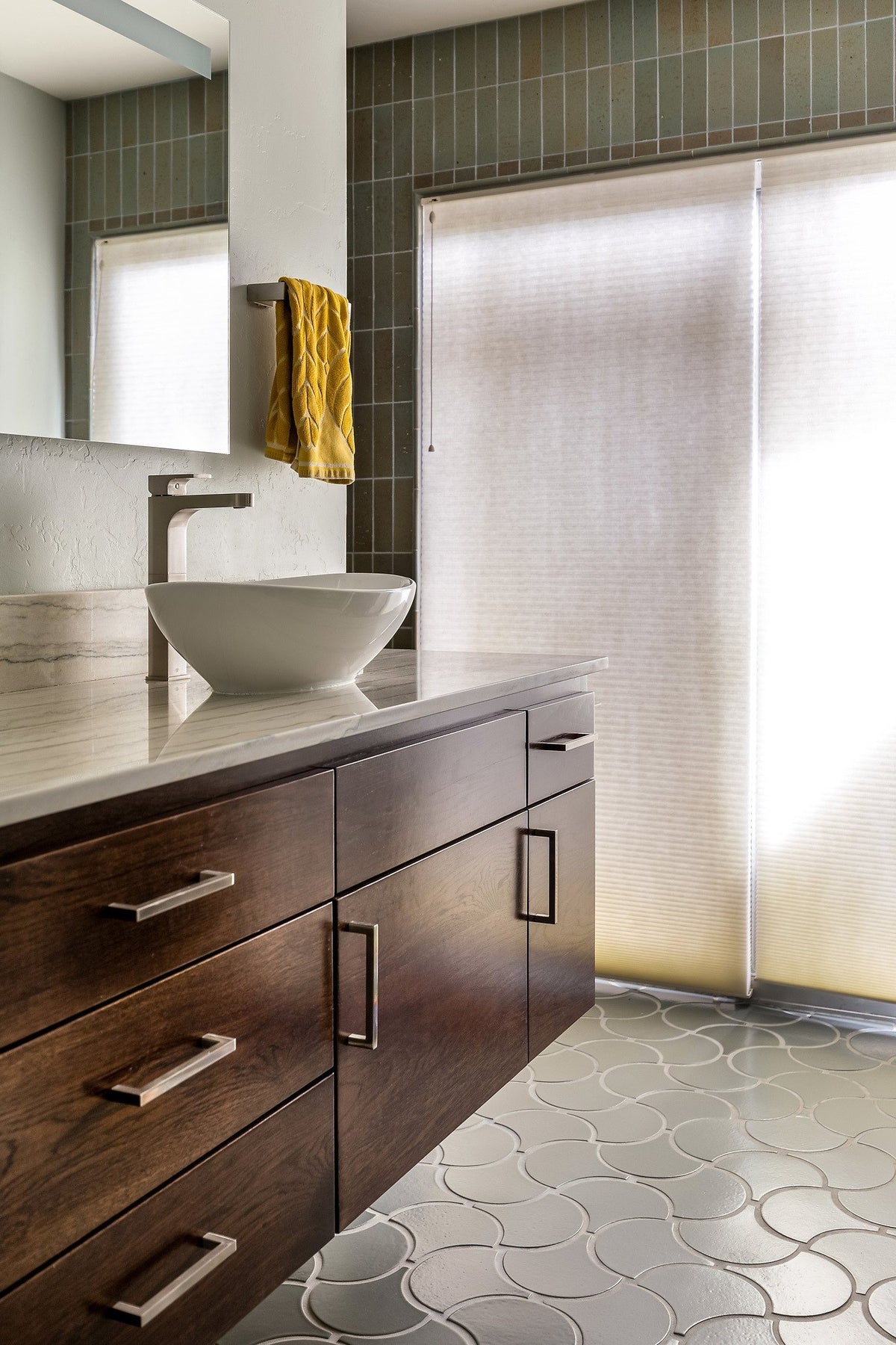 Vanity wall trimmed in glazed brick