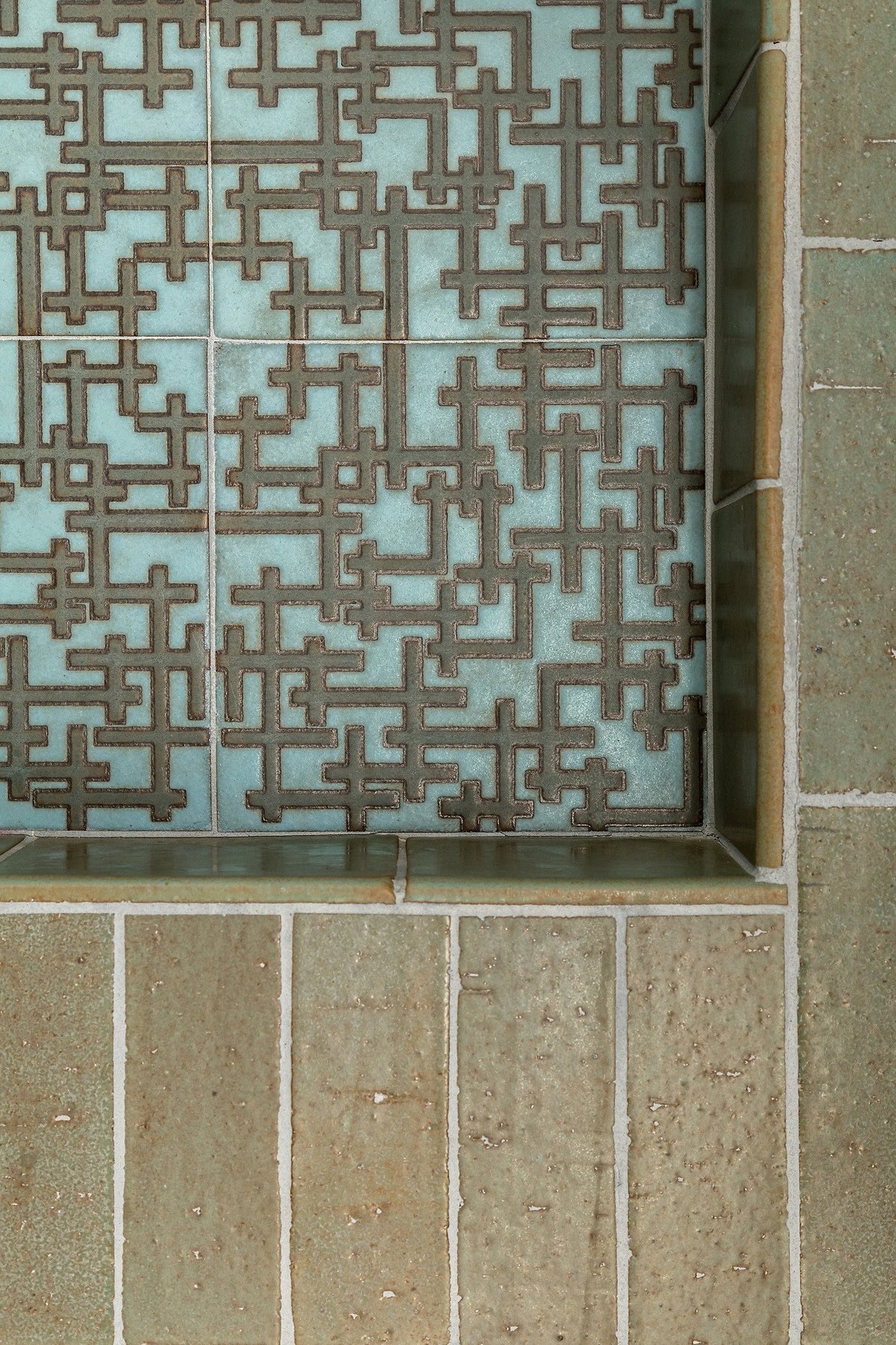 Deco tile and Chrome brick up close