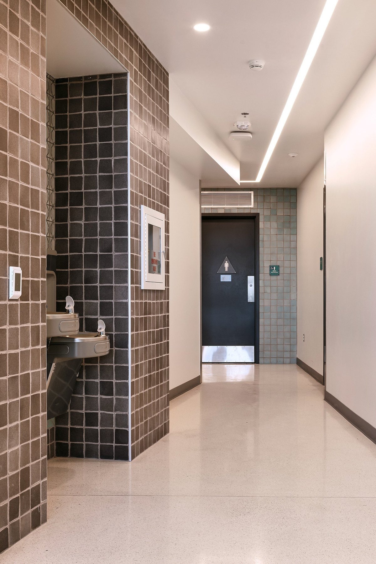 Tiled corridor to the restrooms