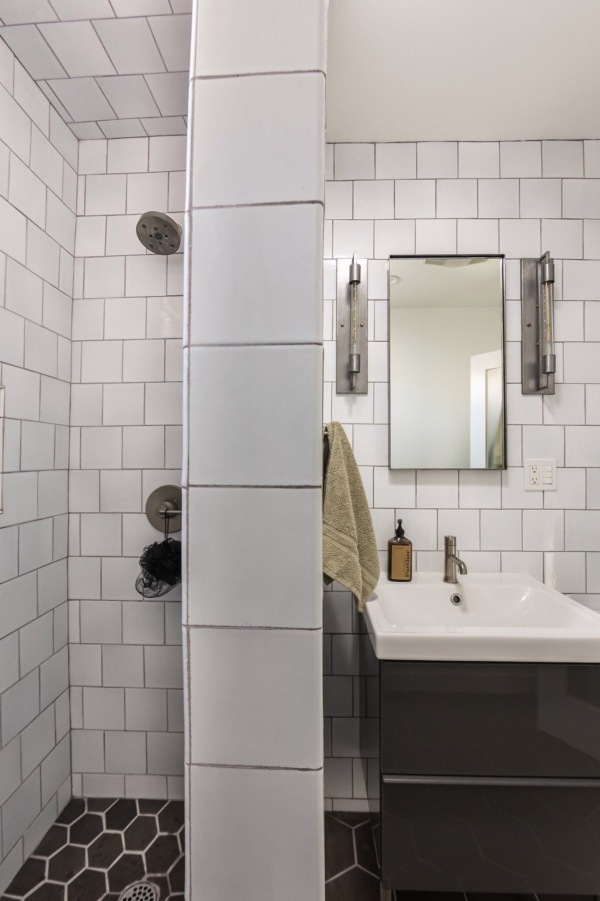 Shower wall and vanity side by side