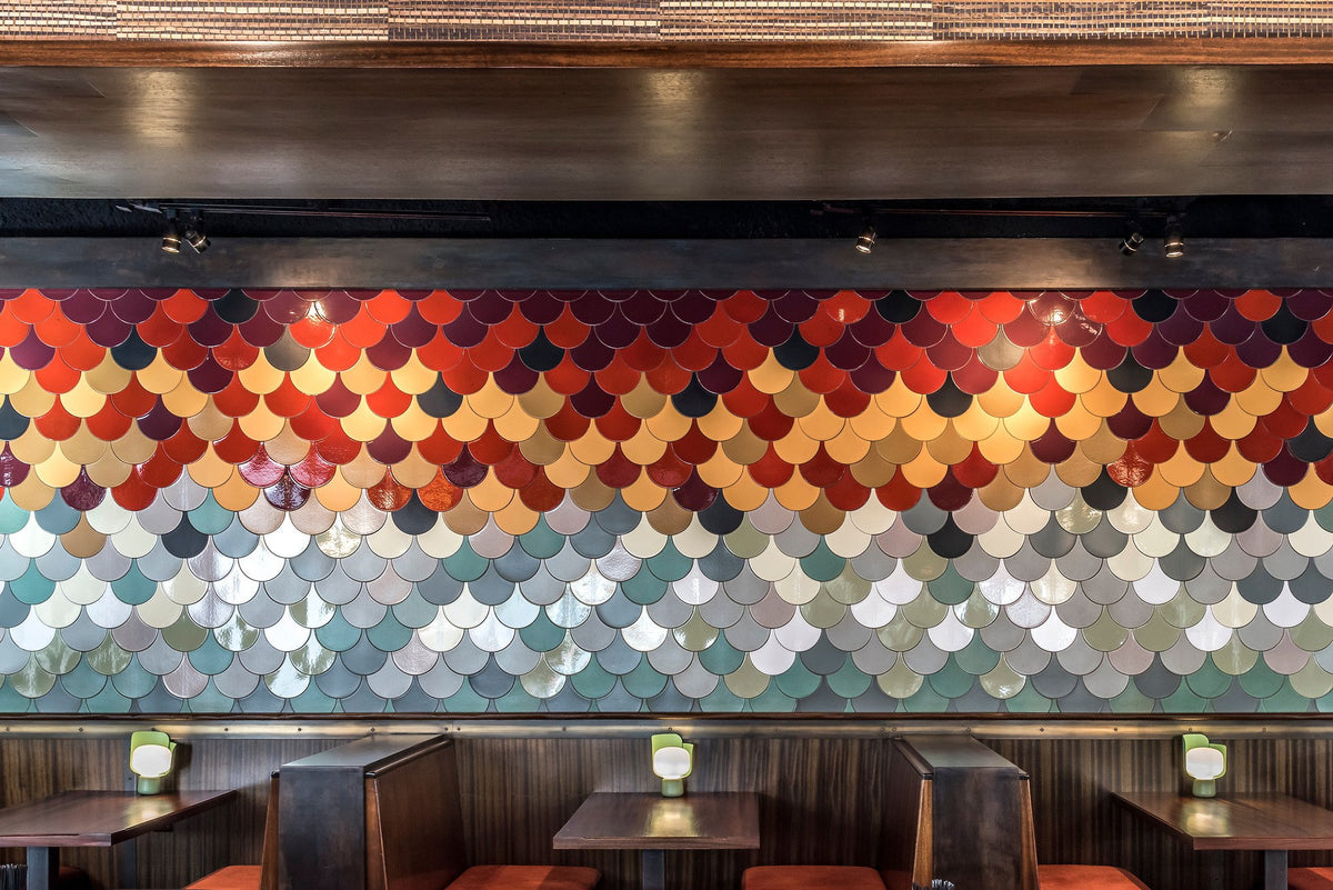Conche feature wall above booths