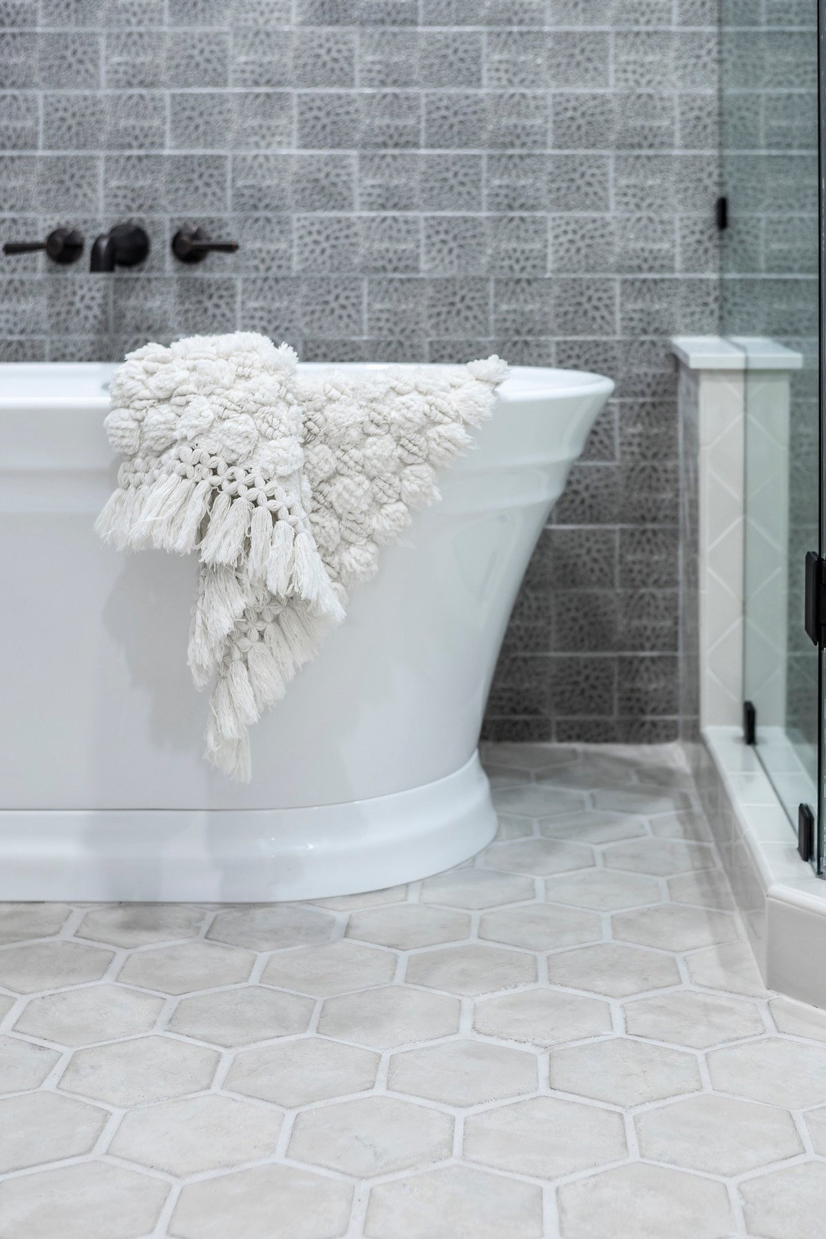 Soaking tub on hexagon tile