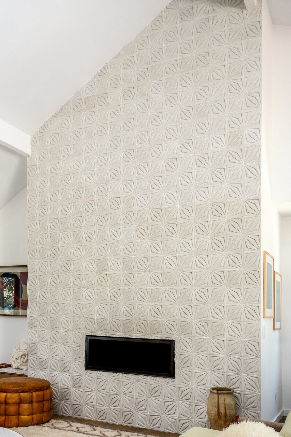 Tile wall rising to the ceiling
