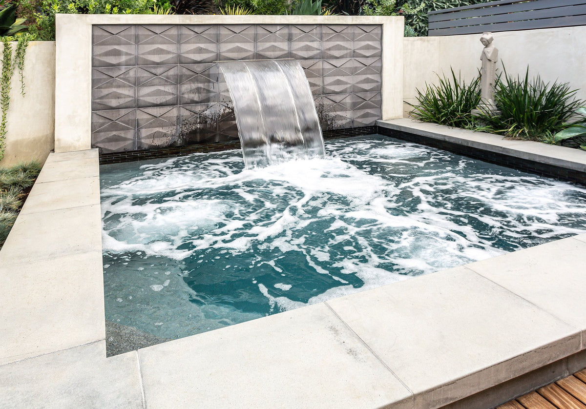 Spa, waterfall and wood deck