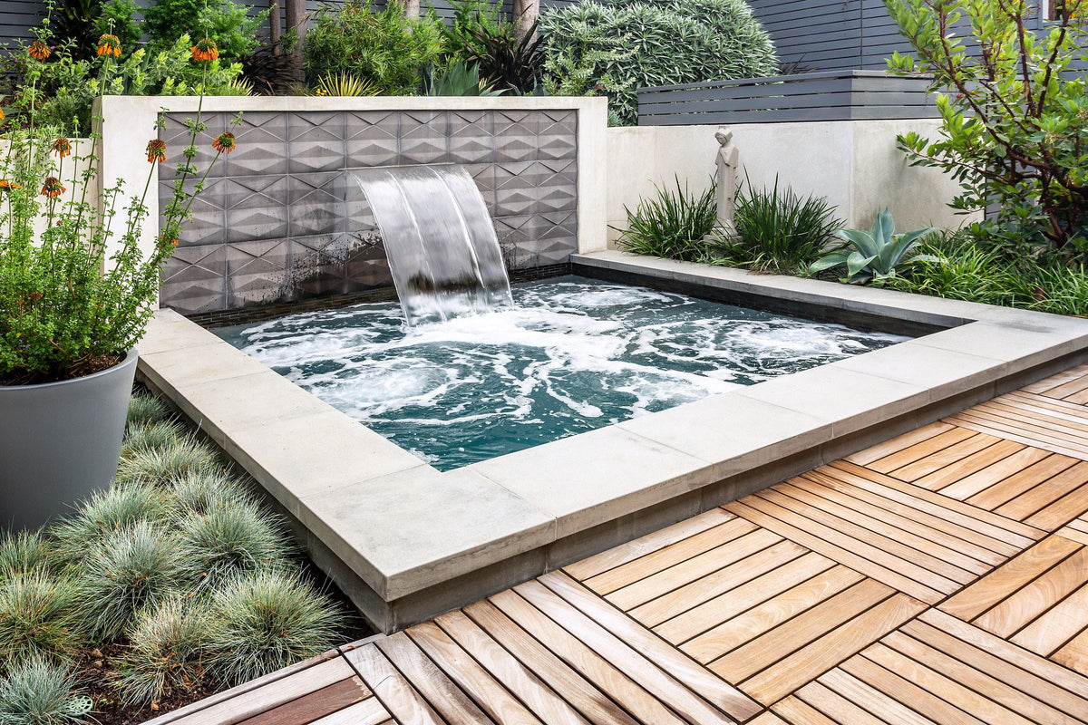 Spa framed by drought-tolerant plants