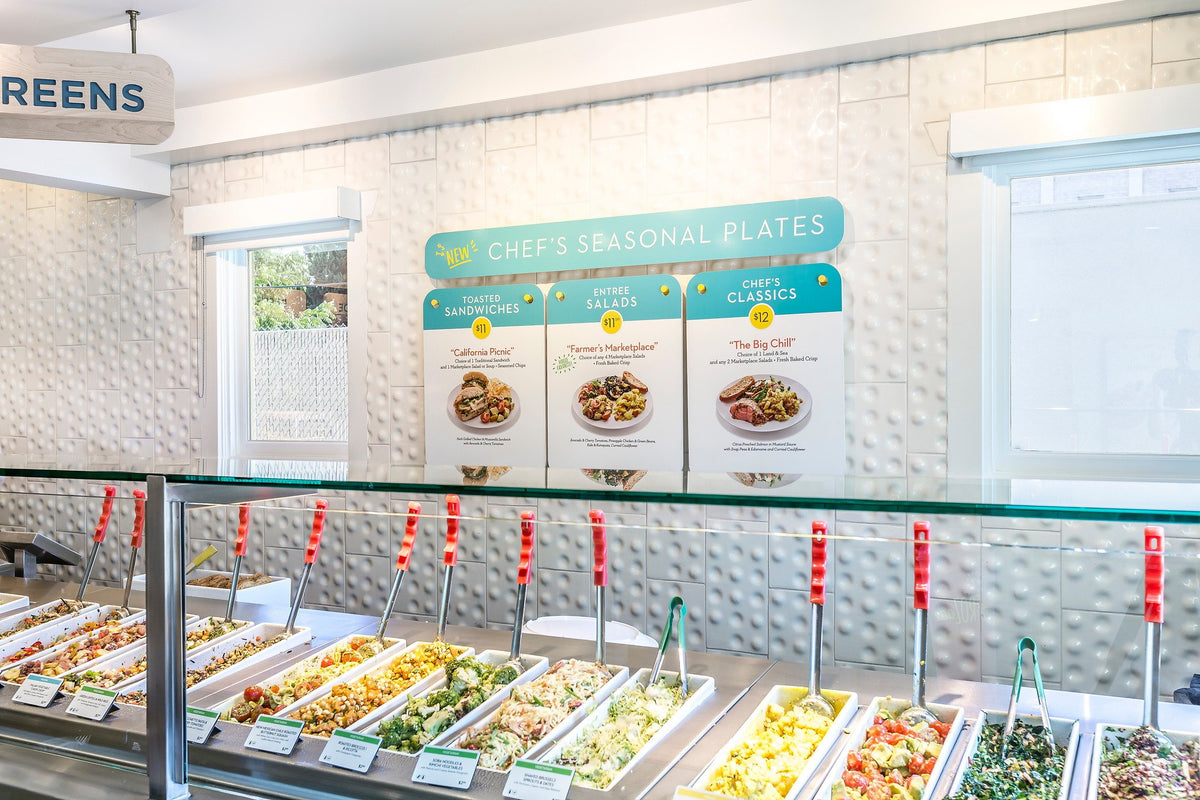 Serving line with white 3D tile wall