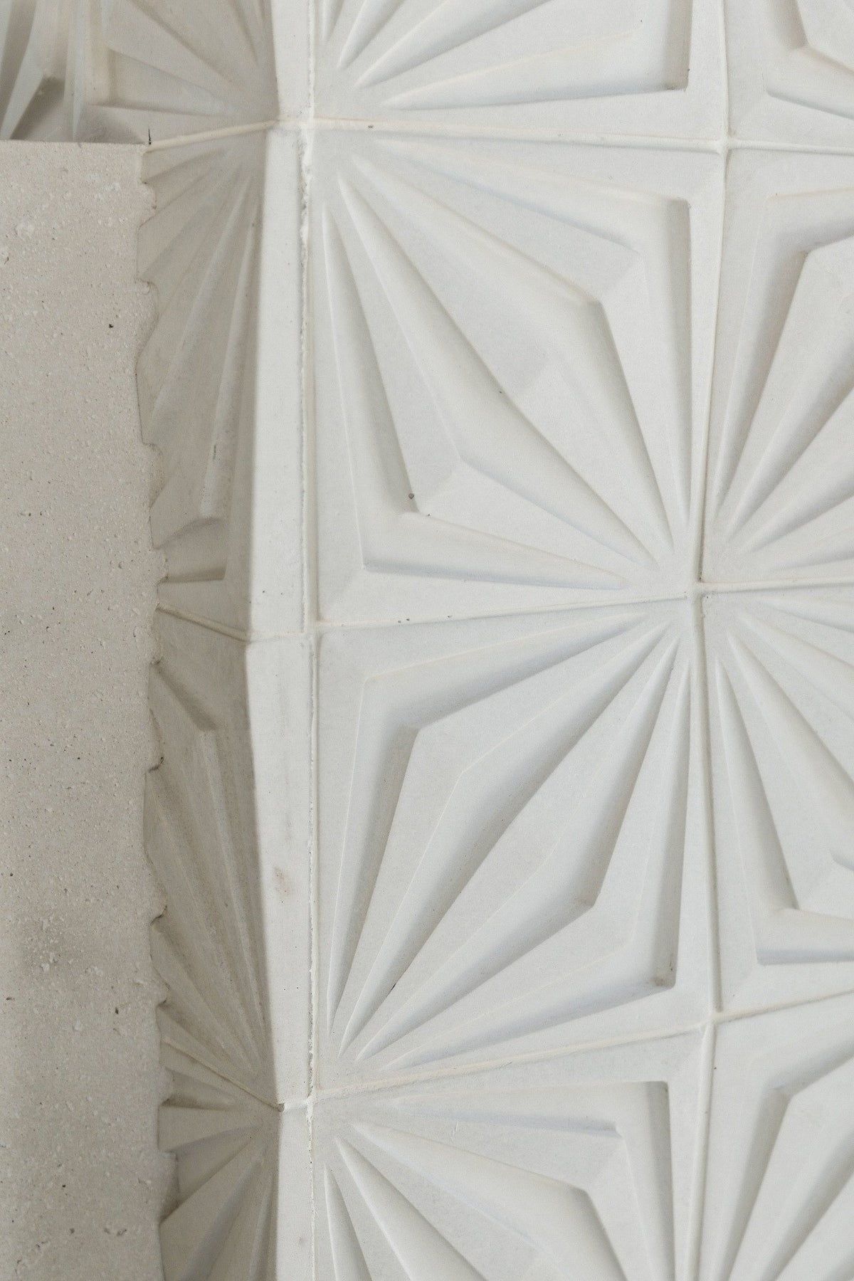 Close-up of carved relief tile