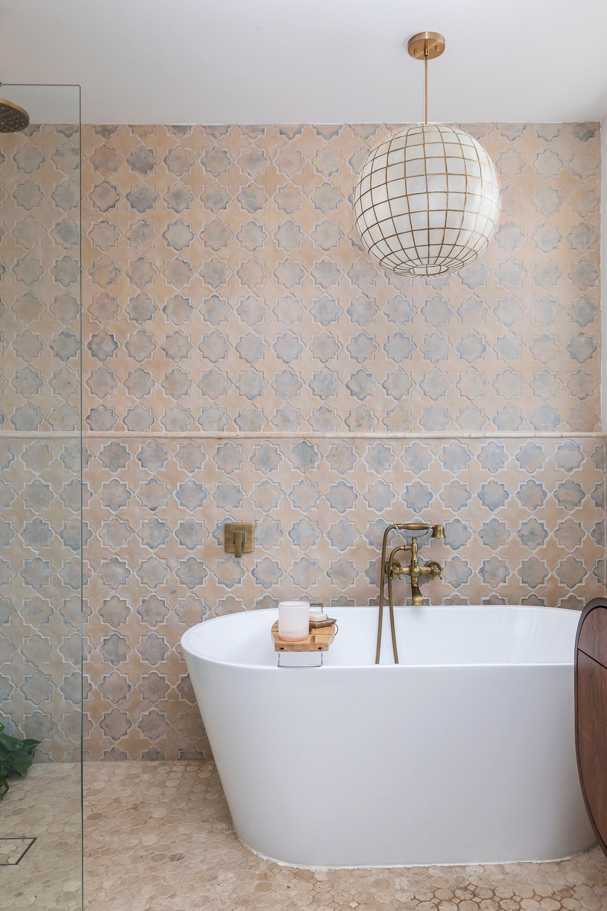 Soaking tub and tiled shower wall